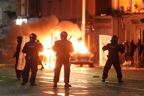 Irish police arrest 34 people in Dublin rioting following stabbings outside a school